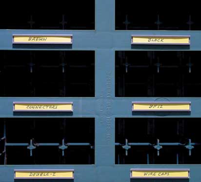 Small plastic card holder to identify slots 