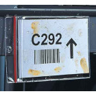 clear sealtite card holder with magnetic backing on a rack